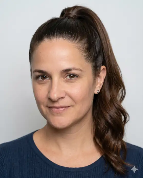 Create a realistic portrait using the uploaded photo, keeping the same face and skin tone unchanged. Change only the hairstyle to a sleek, high ponytail with a smooth crown and a long, slightly wavy tail. The color is glossy dark brown. The person looks at the camera with a confident, fresh expression. Shoot at eye level with bright, even studio lighting and a plain neutral background. Maintain photorealistic detail and keep all facial features identical. Use aspect ratio 4:5.