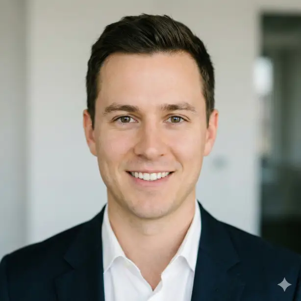 Create a realistic LinkedIn profile photo of a professional person shown from the shoulders up, facing the camera with natural eye contact and a relaxed, confident expression. Use soft natural window light from the front, even skin tones, and minimal shadows. Place the subject against a clean, neutral background with subtle depth blur. Ensure sharp focus, high detail, and a square 1:1 aspect ratio suitable for LinkedIn's circular crop.